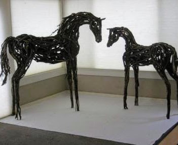 Photo of two mixed media horse sculptures by Brenna Kimbro